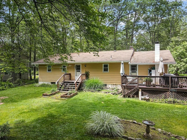 2125 Sassafras Ln, Kunkletown, PA 18058 - rear view of property with a wooden deck, a yard, and a chimney