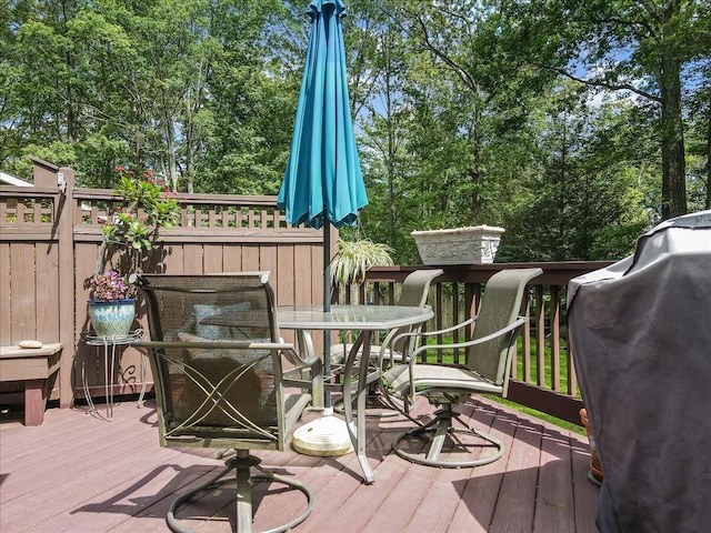 2125 Sassafras Ln, Kunkletown, PA 18058 - wooden terrace featuring outdoor dining space, area for grilling, and view of scattered trees