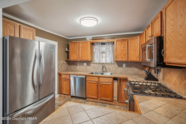 kitchen with a sink, appliances with stainless steel finishes, backsplash, tile counters, and open shelves