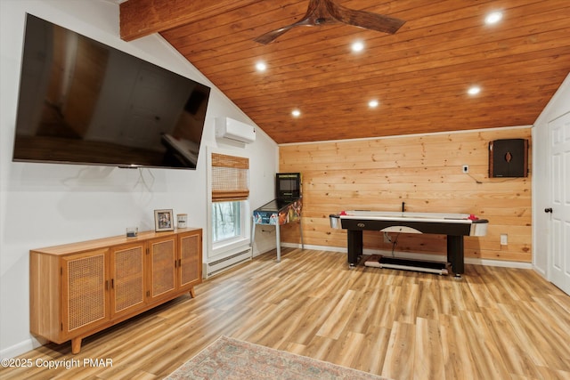 recreation room with vaulted ceiling with beams, a wall mounted air conditioner, wooden ceiling, light wood-style floors, and a ceiling fan