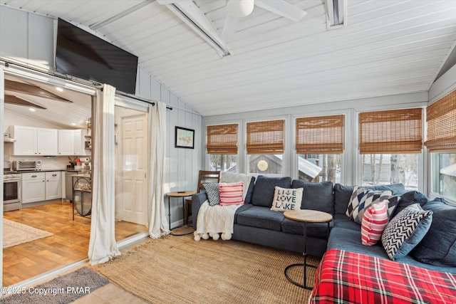 sunroom / solarium with lofted ceiling