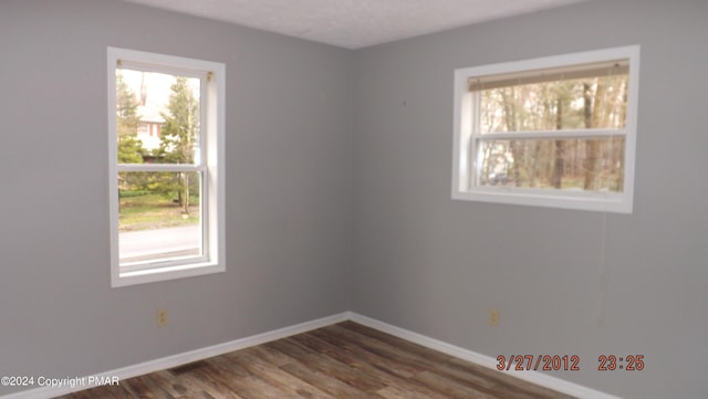 empty room featuring hardwood / wood-style floors