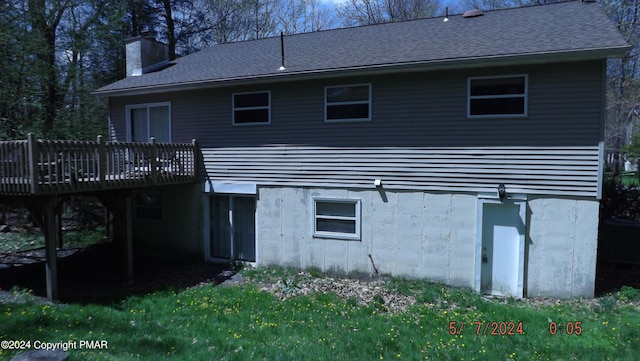 rear view of house with a deck