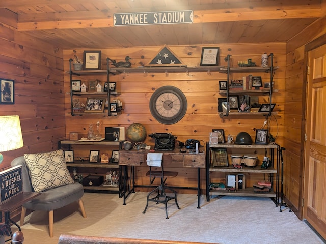 office with wood ceiling, wood walls, and carpet flooring