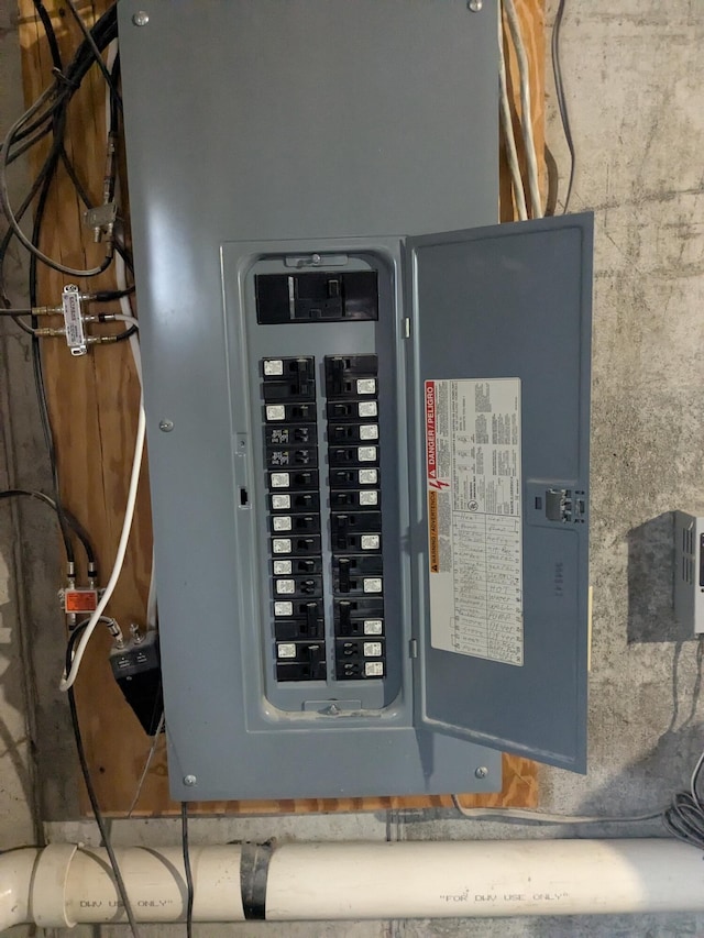 utility room featuring electric panel