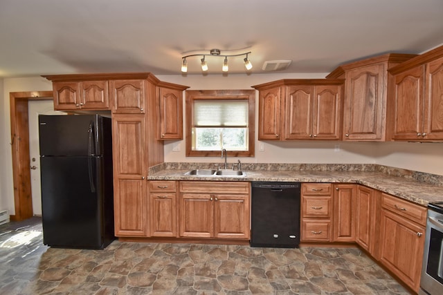 2115 Upper Smith Gap Rd, Saylorsburg, PA 18353 - kitchen with black appliances, dark stone finish floors, and brown cabinets