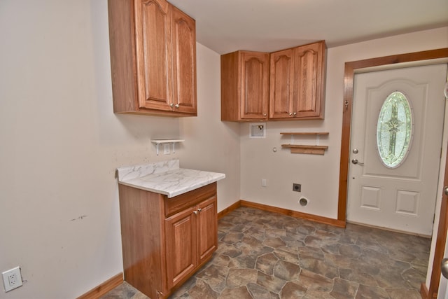 2115 Upper Smith Gap Rd, Saylorsburg, PA 18353 - washroom featuring hookup for a washing machine, electric dryer hookup, dark stone finish flooring, and cabinet space