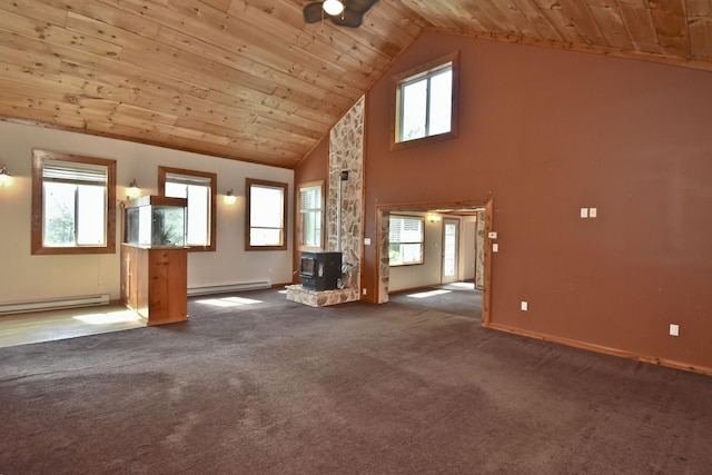 2115 Upper Smith Gap Rd, Saylorsburg, PA 18353 - unfurnished living room with a baseboard heating unit, a wood stove, wooden ceiling, high vaulted ceiling, and healthy amount of natural light