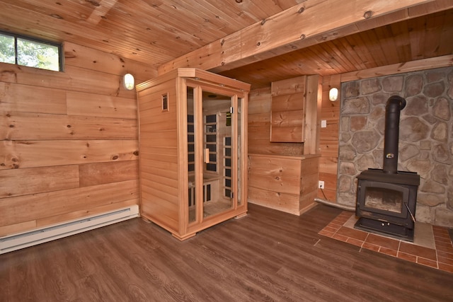 2115 Upper Smith Gap Rd, Saylorsburg, PA 18353 - unfurnished living room featuring a wood stove, wood walls, wood finished floors, and wood ceiling