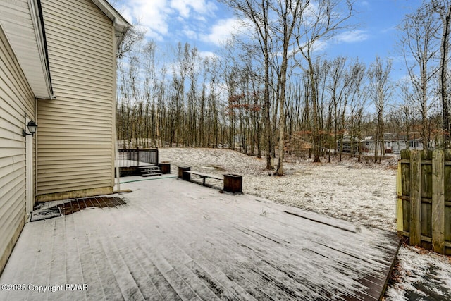 view of snow covered deck