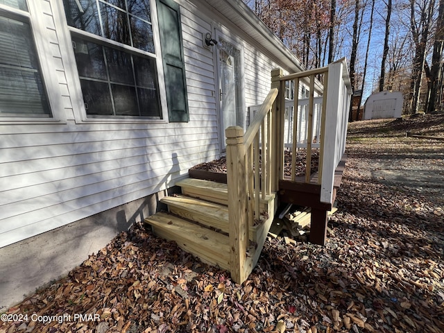 wooden terrace featuring stairway