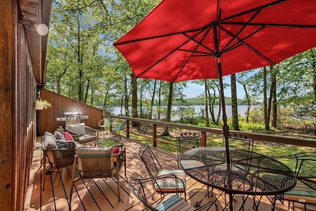 99 Ruffed Grouse Ct, Lake Harmony, PA 18624 - deck featuring a water view and outdoor dining area