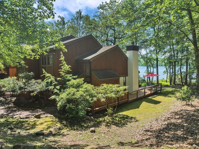 99 Ruffed Grouse Ct, Lake Harmony, PA 18624 - view of home's exterior with a chimney and a deck