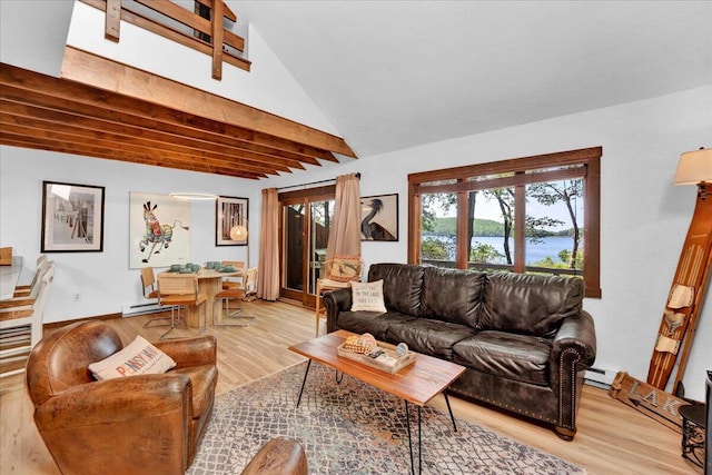 99 Ruffed Grouse Ct, Lake Harmony, PA 18624 - living room with light wood-style floors, a baseboard radiator, and a water view