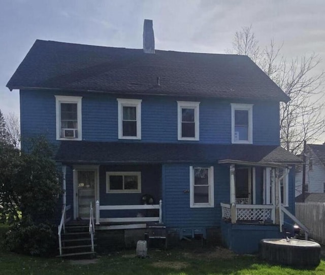 207 Broad Ave, Susquehanna, PA 18847 - view of front of home with covered porch, a chimney, and a shingled roof