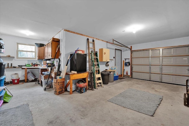 garage with a workshop area