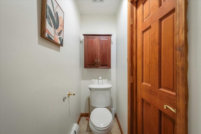 392 Hemlock Dr, Tobyhanna, PA 18466 - bathroom featuring toilet, baseboards, and tile patterned floors