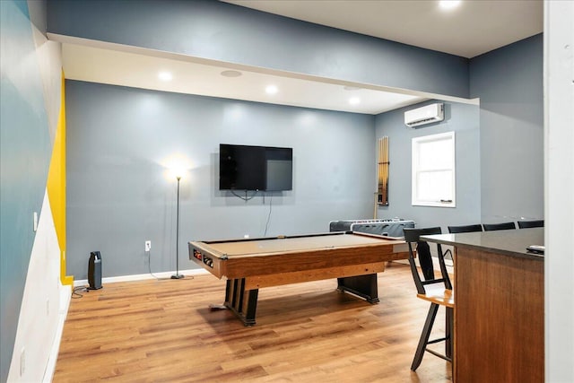 392 Hemlock Dr, Tobyhanna, PA 18466 - playroom featuring light wood finished floors, a wall mounted air conditioner, pool table, baseboards, and recessed lighting