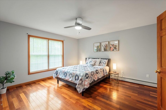 392 Hemlock Dr, Tobyhanna, PA 18466 - bedroom with a baseboard heating unit, wood finished floors, baseboards, and ceiling fan