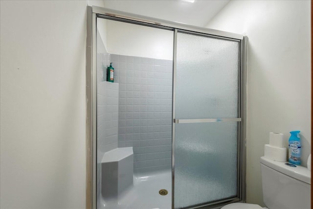 392 Hemlock Dr, Tobyhanna, PA 18466 - bathroom featuring toilet and a stall shower