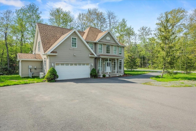 392 Hemlock Dr, Tobyhanna, PA 18466 - view of front of home featuring asphalt driveway and a porch