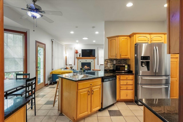 392 Hemlock Dr, Tobyhanna, PA 18466 - kitchen featuring appliances with stainless steel finishes, a sink, ceiling fan, light tile patterned floors, and recessed lighting