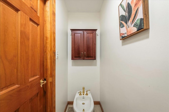 392 Hemlock Dr, Tobyhanna, PA 18466 - bathroom featuring a bidet and baseboards
