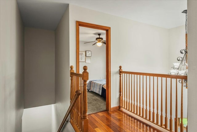 392 Hemlock Dr, Tobyhanna, PA 18466 - hallway with an upstairs landing and wood-type flooring
