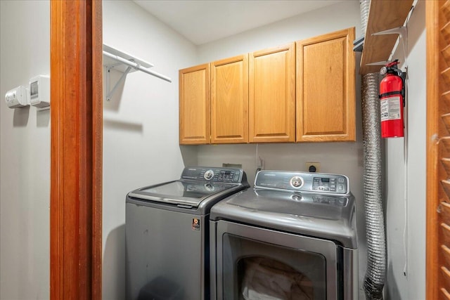 392 Hemlock Dr, Tobyhanna, PA 18466 - laundry area with cabinet space and independent washer and dryer