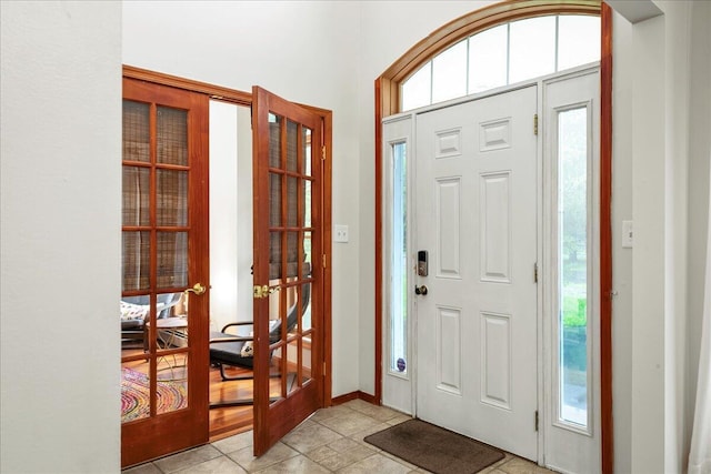 392 Hemlock Dr, Tobyhanna, PA 18466 - entryway featuring french doors and light tile patterned floors