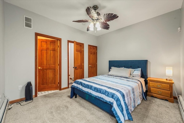 392 Hemlock Dr, Tobyhanna, PA 18466 - bedroom featuring light colored carpet, a baseboard heating unit, baseboards, and ceiling fan