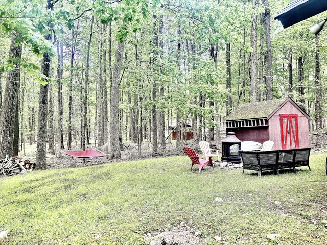 256 Partridge Dr, Pocono Lake, PA 18347 - view of grassy yard featuring a view of trees