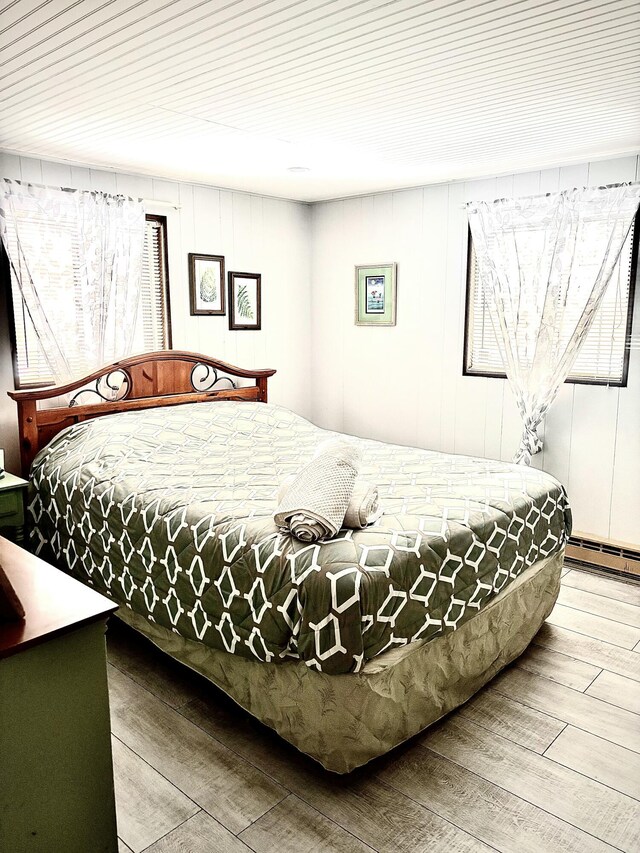 256 Partridge Dr, Pocono Lake, PA 18347 - bedroom featuring hardwood / wood-style flooring and a baseboard radiator
