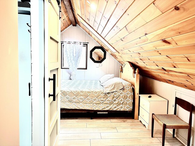 256 Partridge Dr, Pocono Lake, PA 18347 - bedroom featuring wooden ceiling, wood finished floors, and wood walls