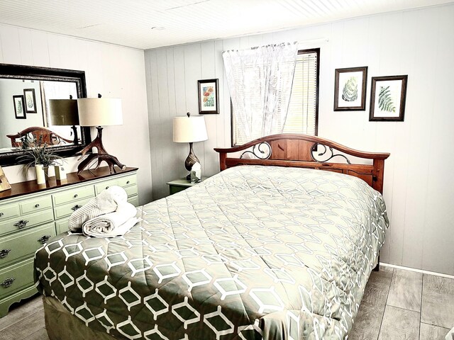 256 Partridge Dr, Pocono Lake, PA 18347 - bedroom featuring baseboards and wooden walls