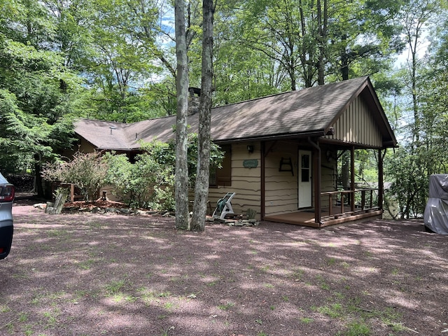 40 Crest Dr, Lake Harmony, PA 18624 - view of side of property with roof with shingles