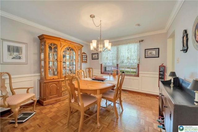 536 Mcilhaney Rd, Stroudsburg, PA 18360 - dining room featuring a chandelier, ornamental molding, wainscoting, and a decorative wall