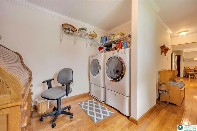 536 Mcilhaney Rd, Stroudsburg, PA 18360 - washroom with washing machine and dryer, light wood-style flooring, and crown molding