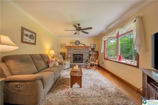 536 Mcilhaney Rd, Stroudsburg, PA 18360 - living room featuring crown molding, a ceiling fan, wood finished floors, and a fireplace