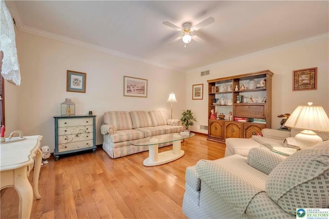 536 Mcilhaney Rd, Stroudsburg, PA 18360 - living area with a ceiling fan, crown molding, and light wood-type flooring