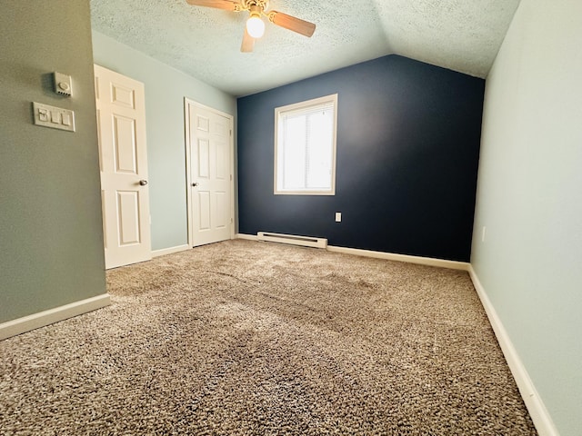 carpeted spare room with baseboards, ceiling fan, a baseboard heating unit, and a textured ceiling