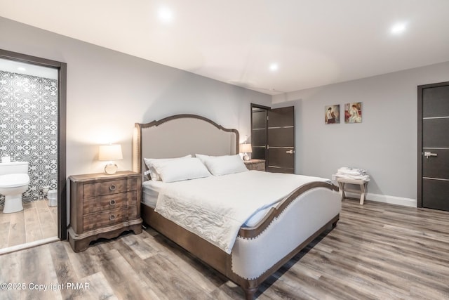 bedroom featuring hardwood / wood-style flooring