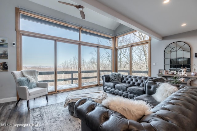 living area with recessed lighting, a healthy amount of sunlight, a ceiling fan, and wood finished floors