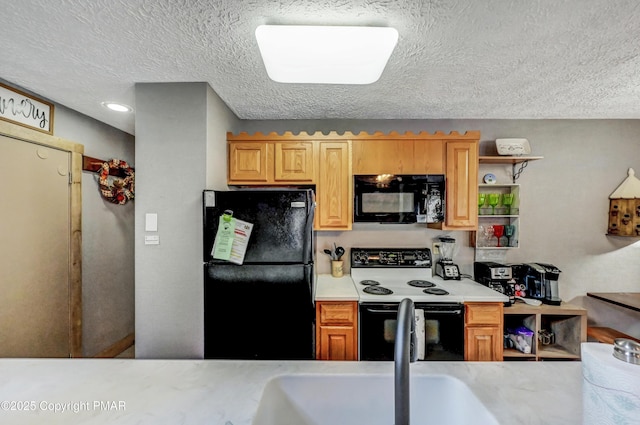 kitchen with light countertops, a textured ceiling, black appliances, open shelves, and a sink