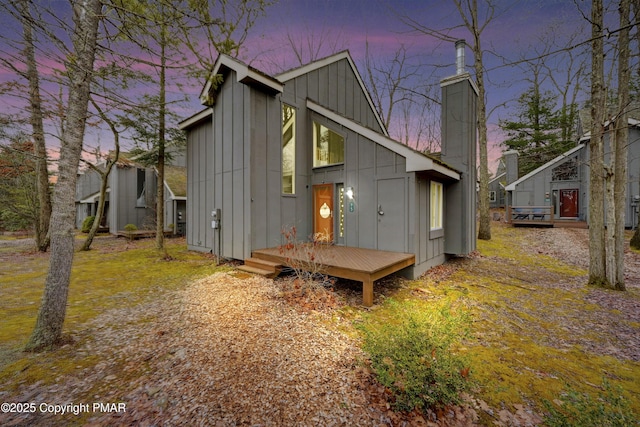 back of house featuring board and batten siding