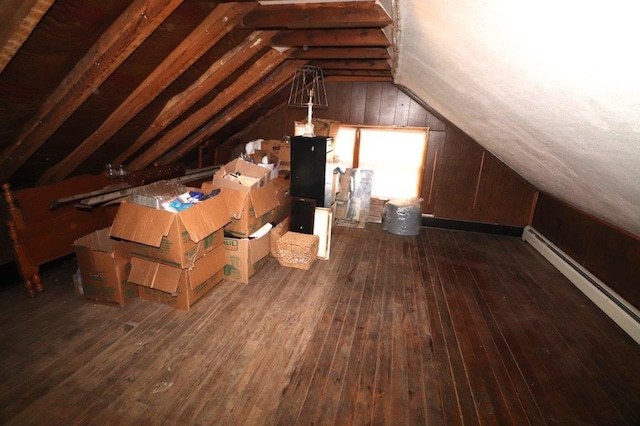 unfinished attic with a baseboard radiator