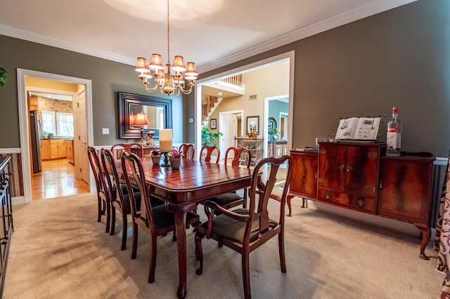 49 Central Dr, Easton, PA 18045 - dining space featuring crown molding, a chandelier, and light colored carpet