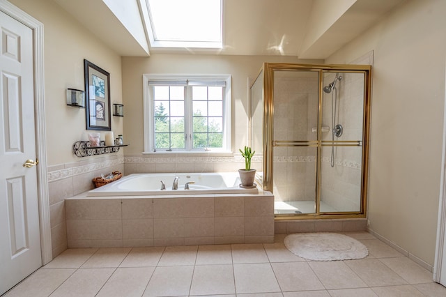 49 Central Dr, Easton, PA 18045 - full bathroom with a garden tub, a stall shower, tile patterned flooring, and a skylight
