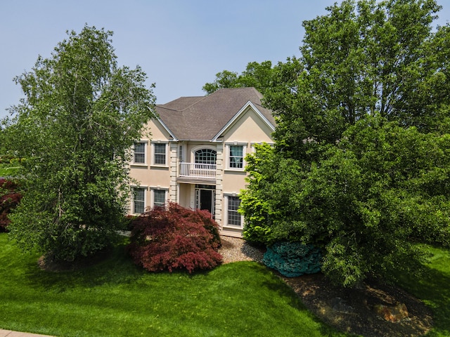 49 Central Dr, Easton, PA 18045 - colonial house with stucco siding and a front lawn