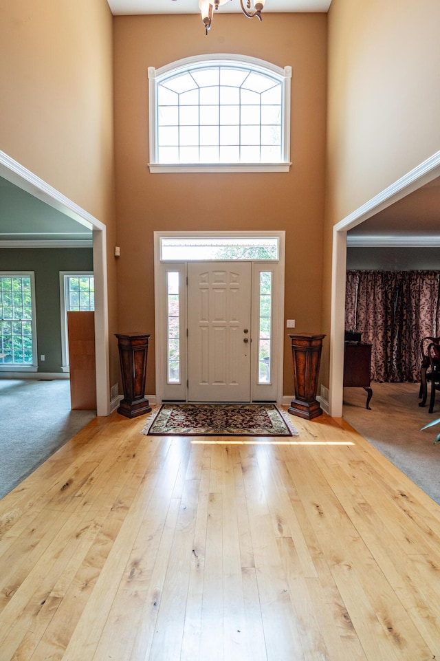 49 Central Dr, Easton, PA 18045 - entryway with a high ceiling, hardwood / wood-style floors, a chandelier, healthy amount of natural light, and baseboards